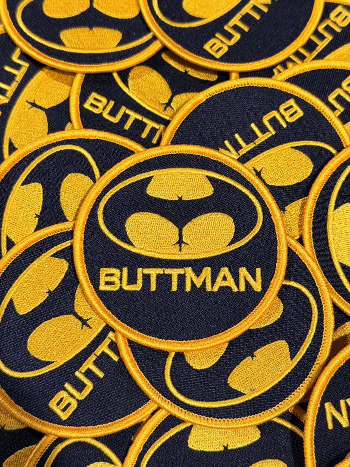 Buttman embleem