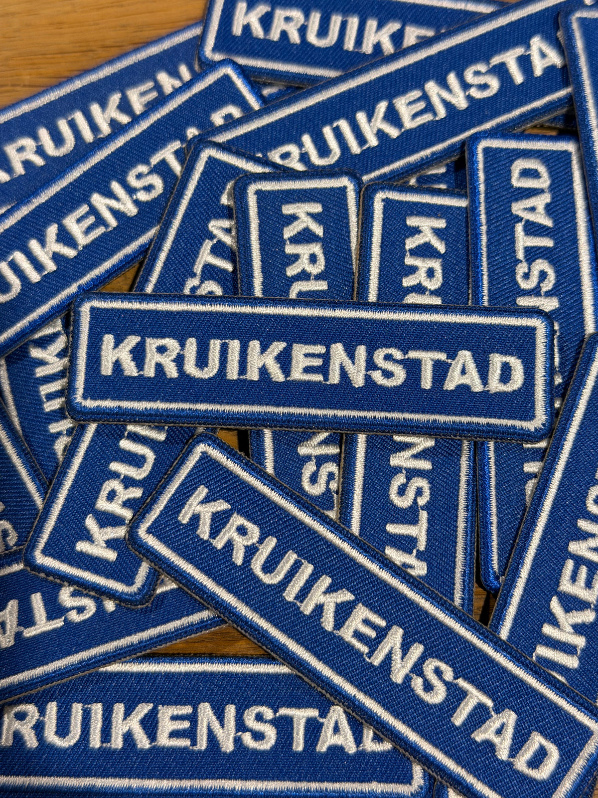 Kruikenstad naambordje embleem