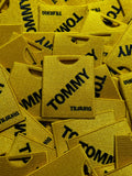 TOMMY badge