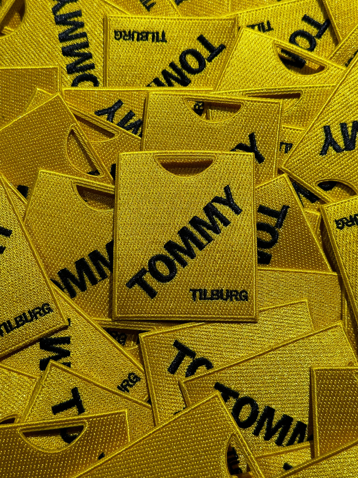 TOMMY badge