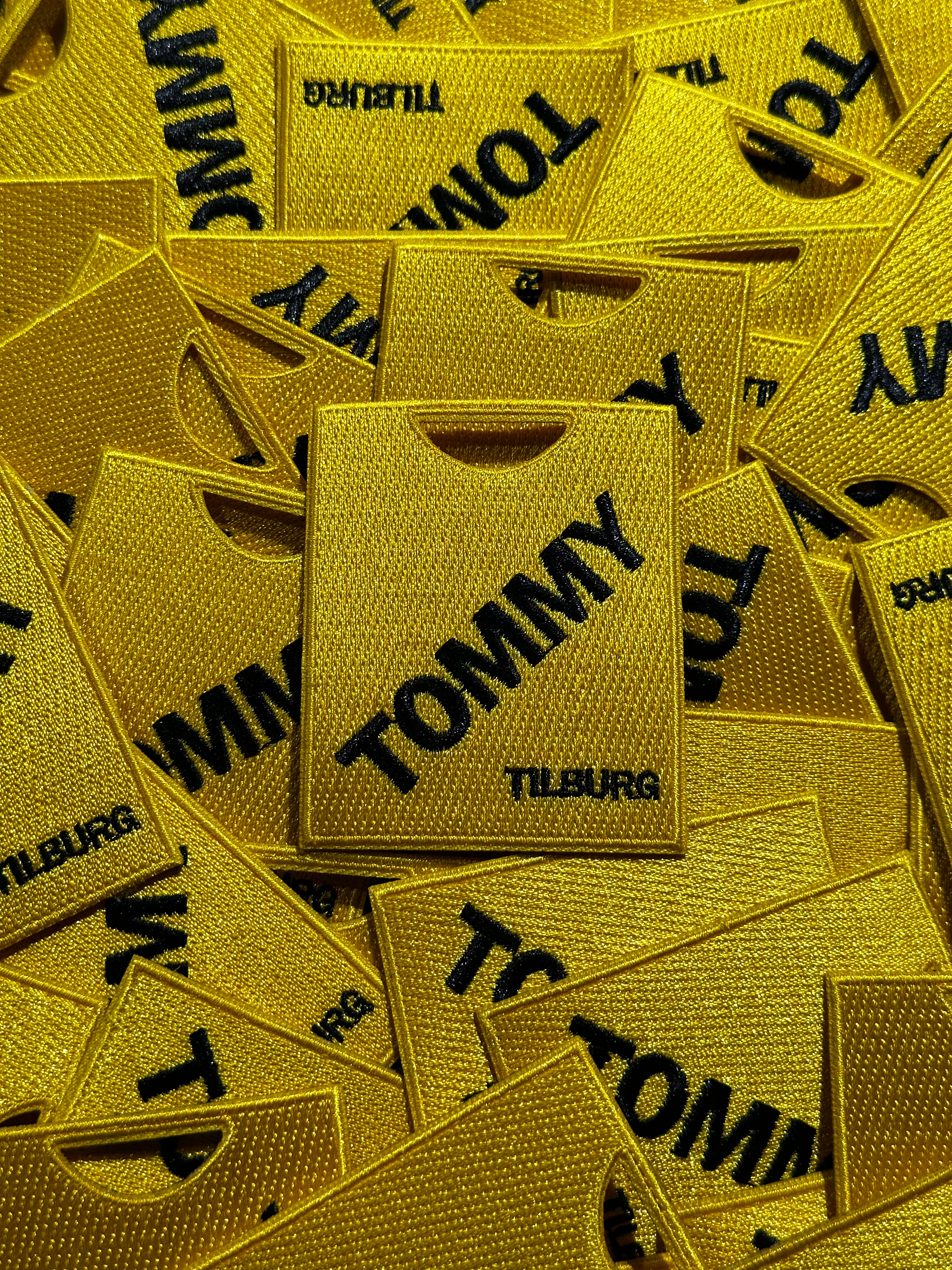 TOMMY badge
